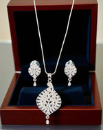 Elegant Silver Crystal Leaf Pendant Necklace Set with Matching Drop Earrings Party & Festive Wear