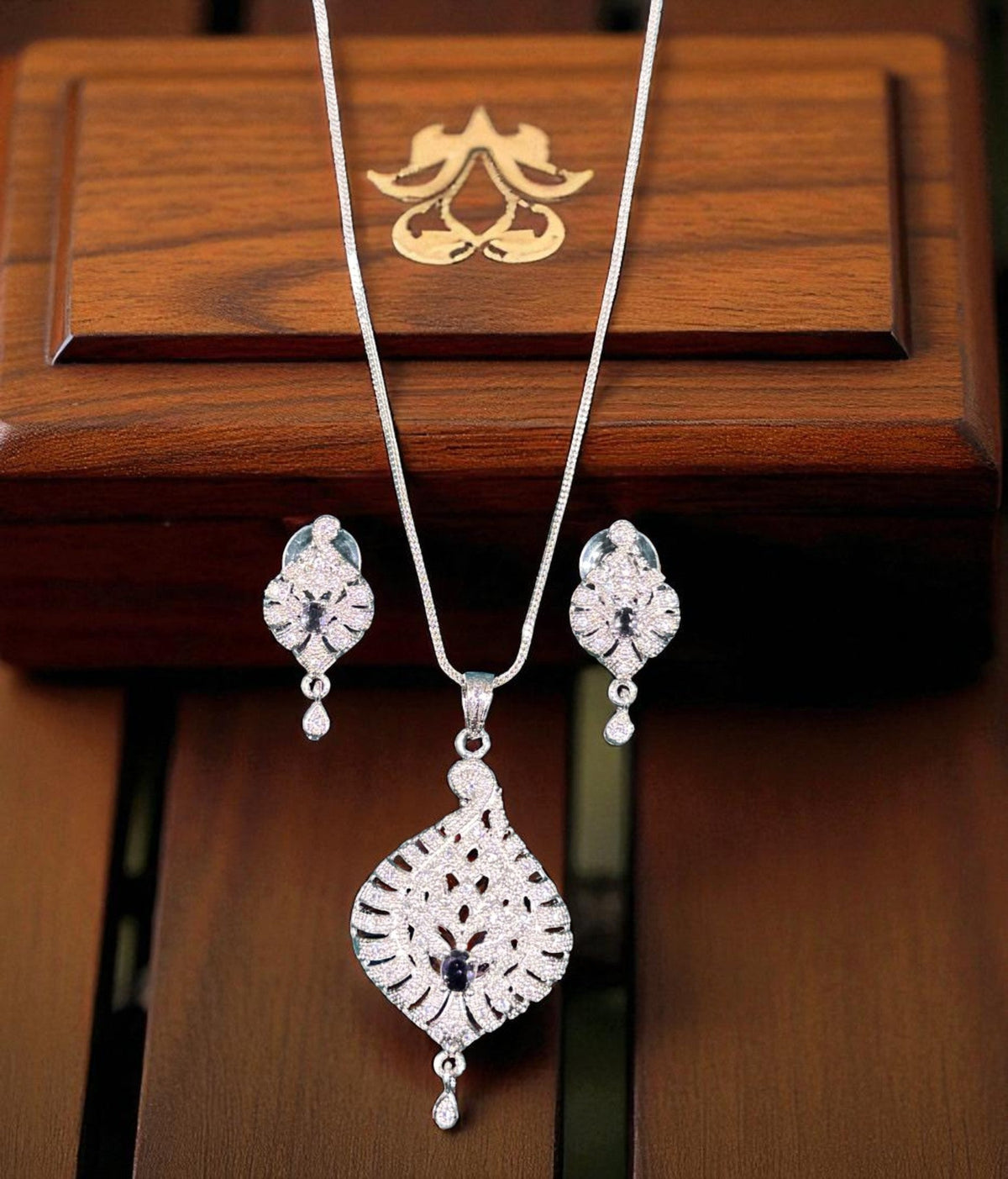 Elegant Silver Crystal Leaf Pendant Necklace Set with Matching Drop Earrings Party & Festive Wear