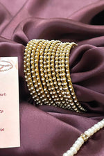 Gold plated pearl bangles