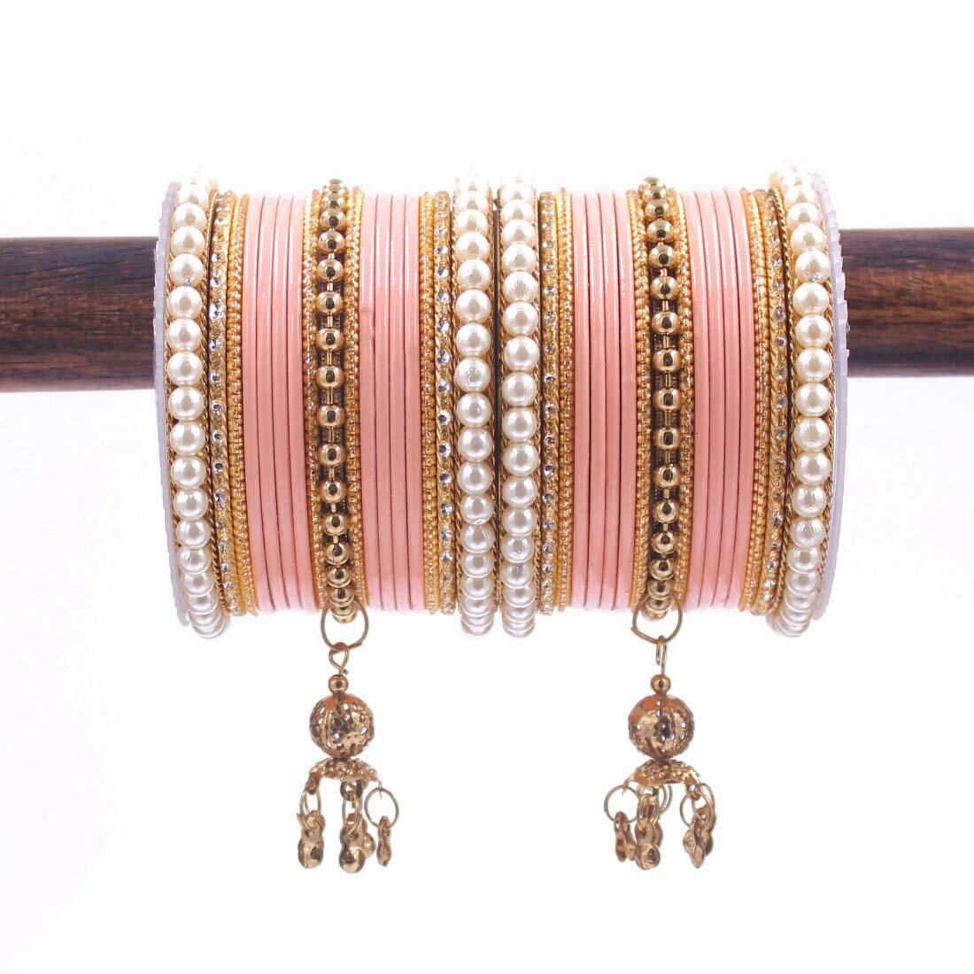 Indian bangle set , Bridal bangles, Metal bangles, Traditonal wedding jewelry, Brass Metal and Pearl Bridal Bangle Set with Jhumki - Libasaa