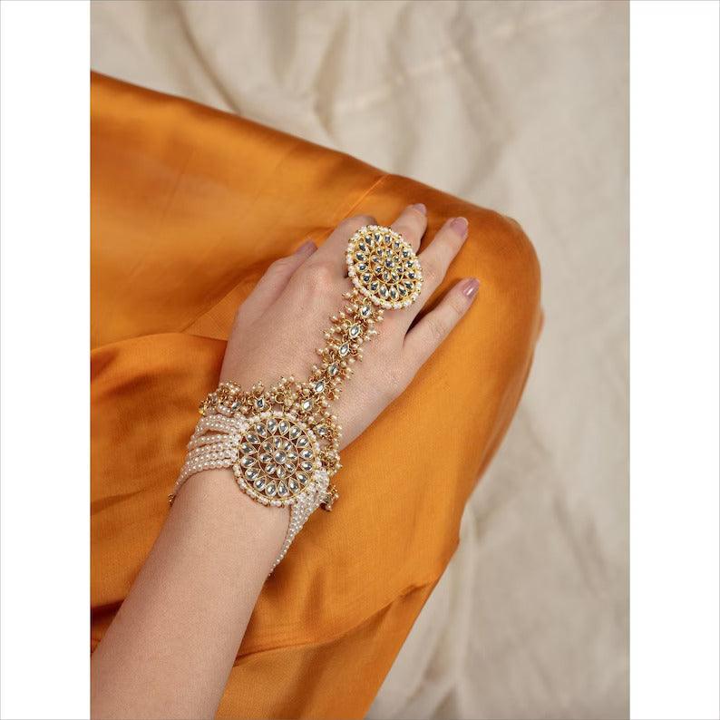 White Kundan Stones & Pearl Adjustable Haath Phool, Panja Bracelet, Gold Plated Ring Bracelet, Indian Jewelry | Gifts for Her - Libasaa