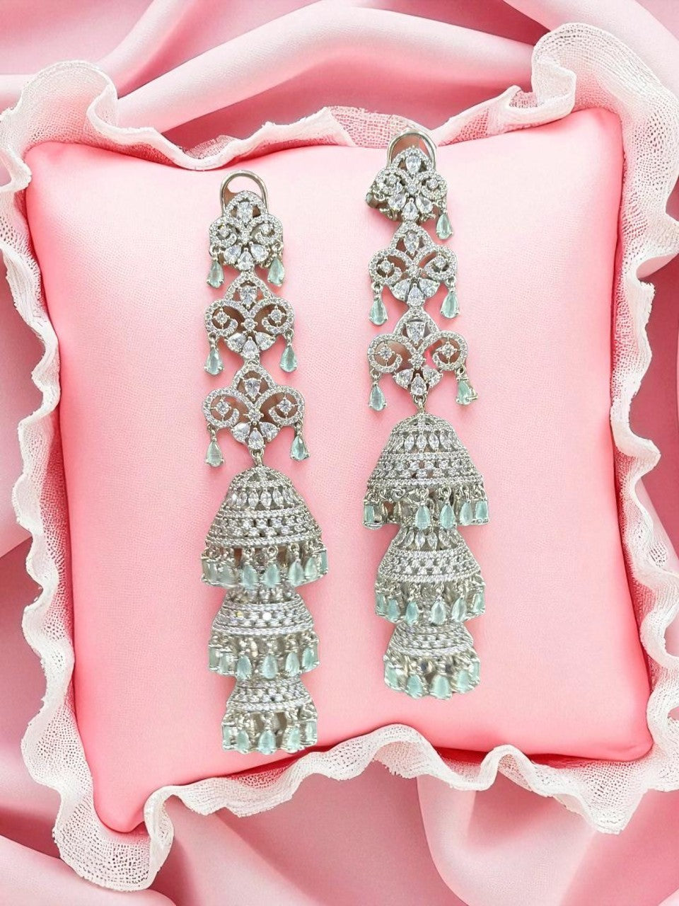 Triple Jhumka CZ Drop Earrings – Designer Tiered Danglers with Mint Green Accents