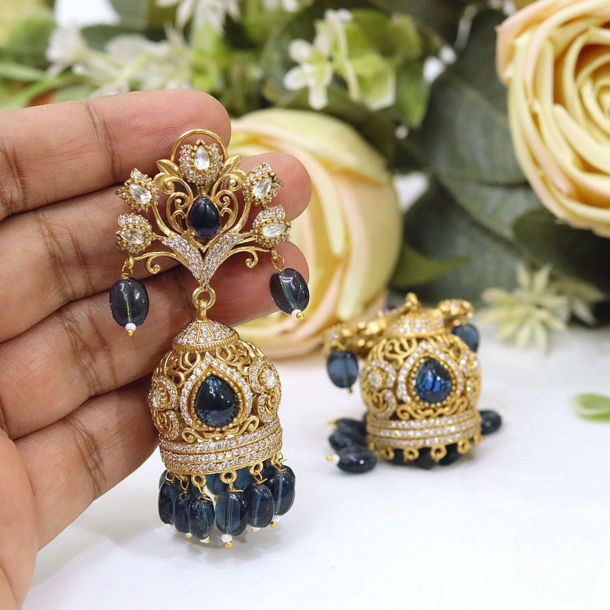 Antique Gold-Plated Jhumka Earrings with Royal Blue Stones and Filigree Peacock Studs