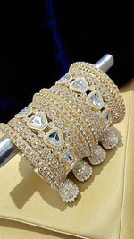 Luxury Gold-Plated Bridal Bangles with Crystal Stones & Jhumka Tassels